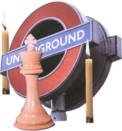 It's just a London Underground sign, a chess king, and a few candles. As you suspected.